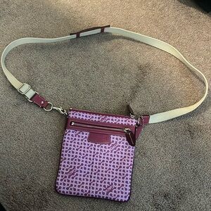Coach purse lt pink and dk pink w/off white weaved adjustable shoulder strap.